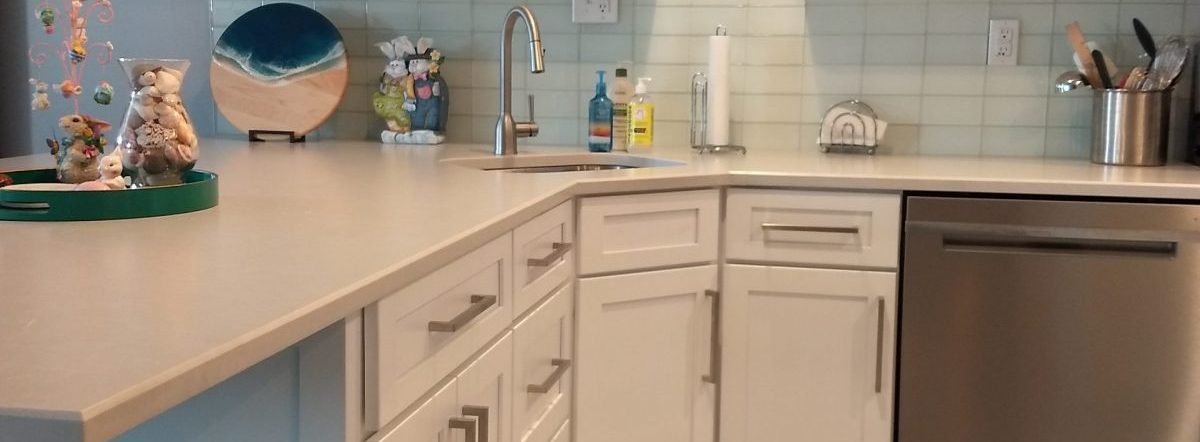 renovated kitchen cabinets and decorative shelving