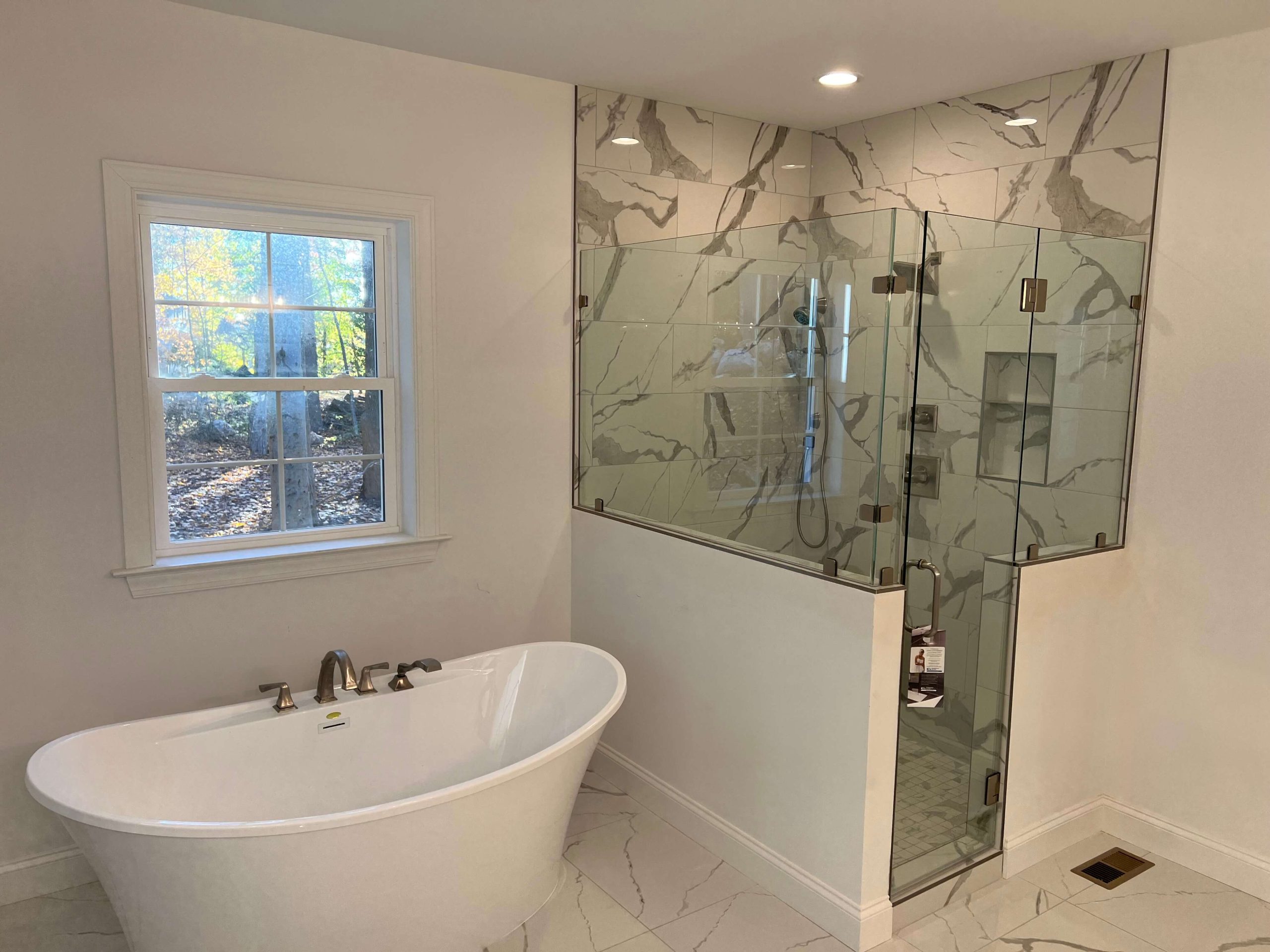 renovated-bathroom-marble-shower-pristine-tub